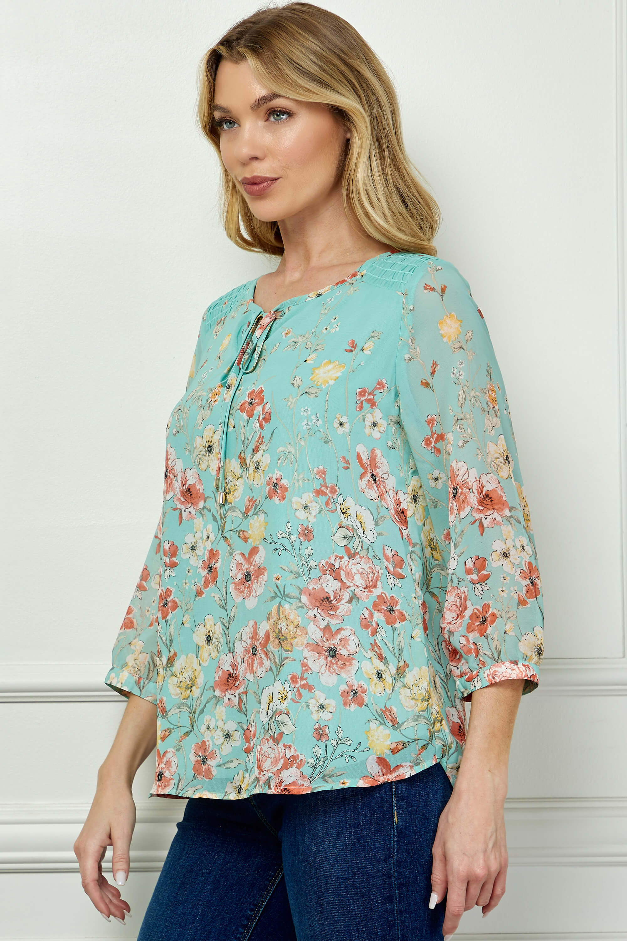 3/4 Button Cuff Smock Shoulder Tie Neck Border Print Blouse in Seafoam Petals - Image 3